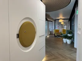 Fire Hose Station recessed into the wall of an office interior