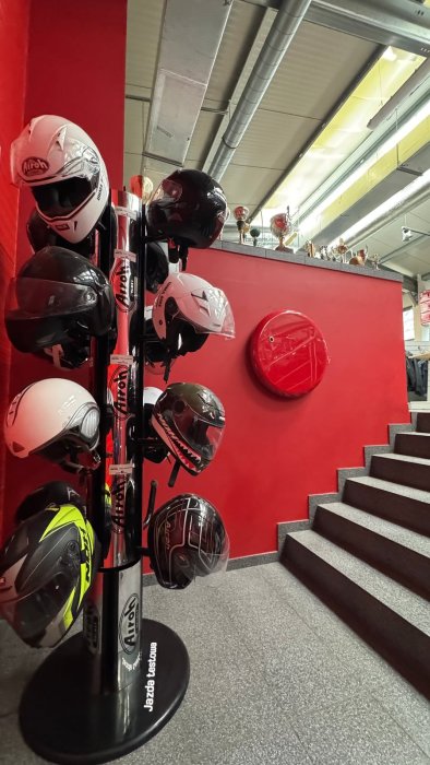 Amplla SafeMaker ST - Red fire extinguisher in a motorcycle showroom in Warsaw